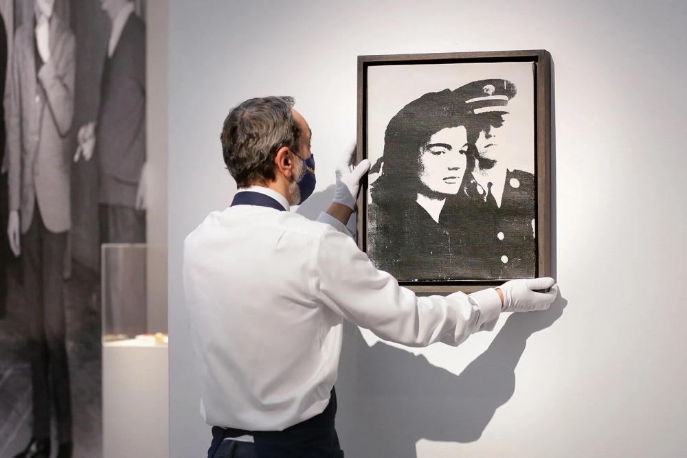 A 1964 Andy Warhol, “Jackie,” went for about $1.1 million